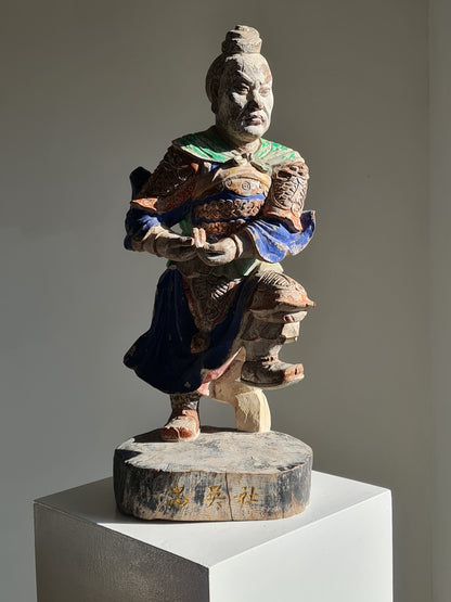 A Chinese polychrome wood temple guardian, marked “Zhōnghào Shè” (忠昊社), late 18/19th century