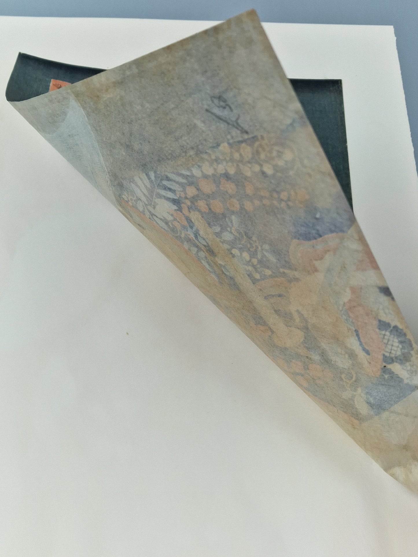 A Japanese woodblock print of a kabuki actor with blue robe and hat — Toyohara Kunichika (1835–1900), Meiji period