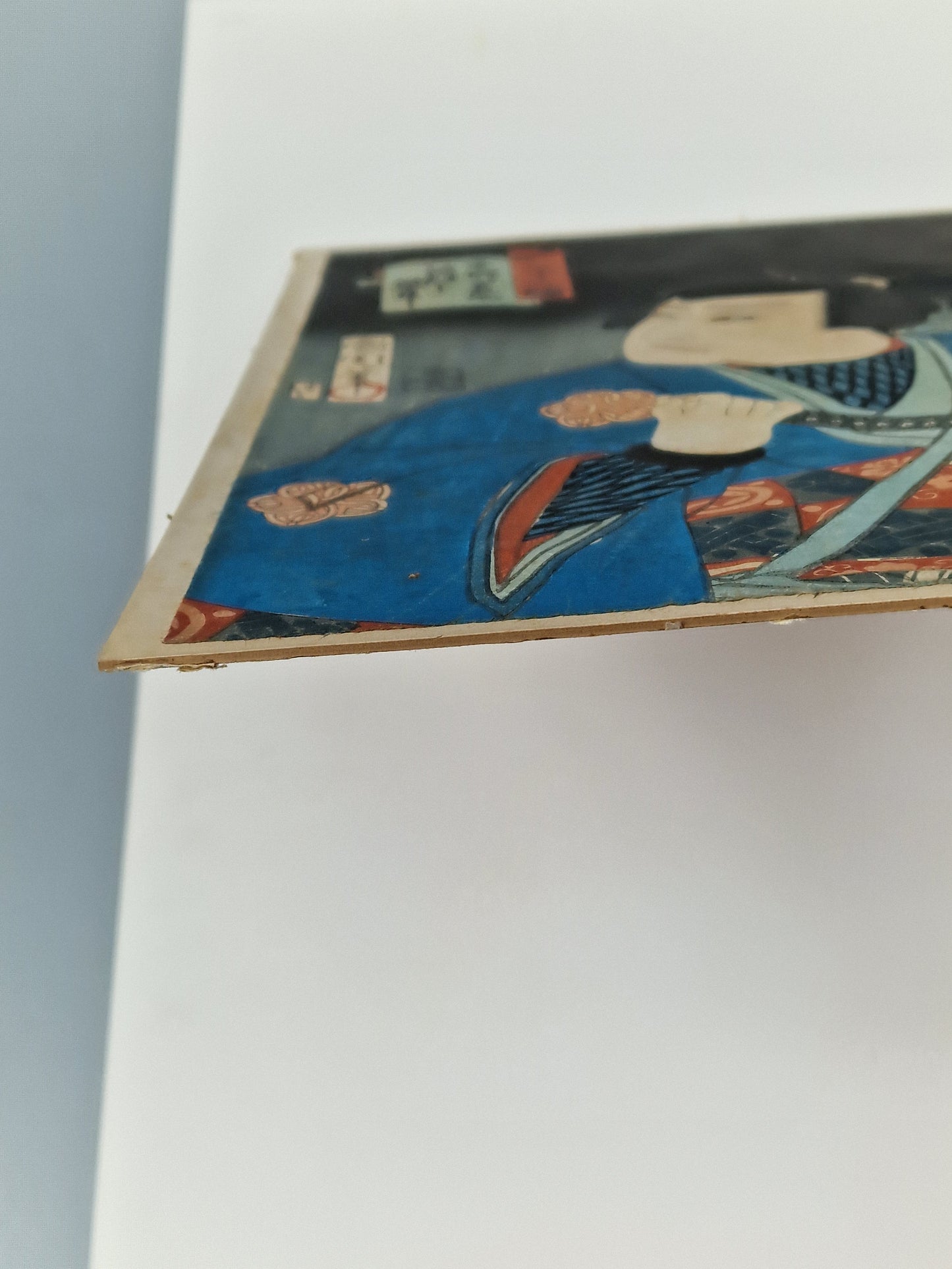 A Japanese woodblock print of a kabuki actor with sword — Toyohara Kunichika (1835–1900), Meiji period