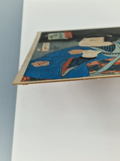 A Japanese woodblock print of a kabuki actor with sword — Toyohara Kunichika (1835–1900), Meiji period