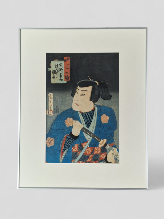 A Japanese woodblock print of a kabuki actor with sword — Toyohara Kunichika (1835–1900), Meiji period