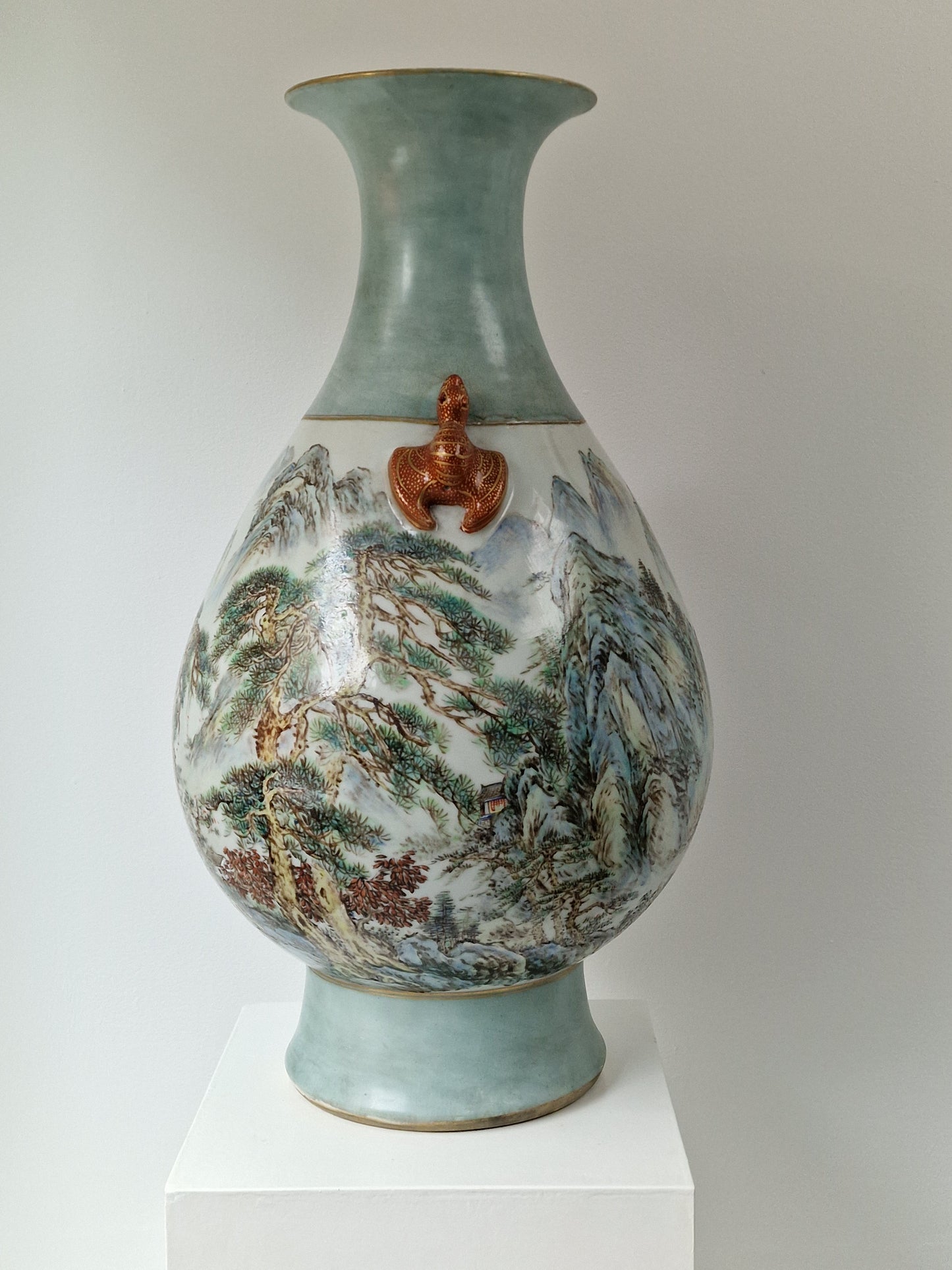 A large Chinese porcelain vase with landscape decoration and moulded bat handles — 20th century