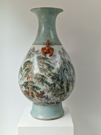 A large Chinese porcelain vase with landscape decoration and moulded bat handles — 20th century