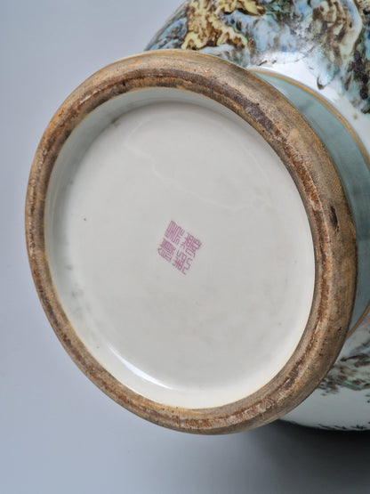 A large Chinese porcelain vase with landscape decoration and moulded bat handles — 20th century