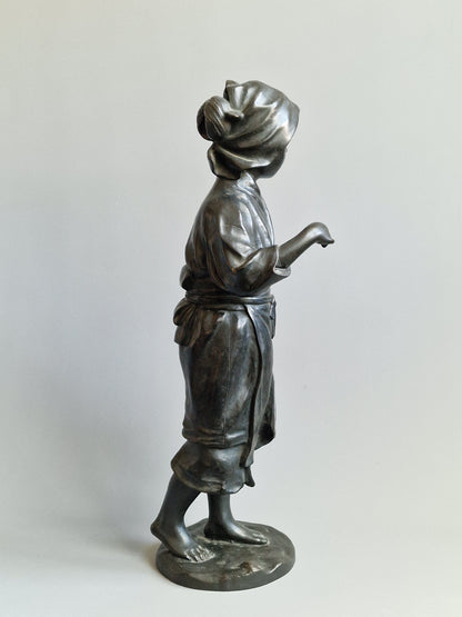A Japanese Bronze Okimono of a Peasant Girl — Meiji period (1868–1912)