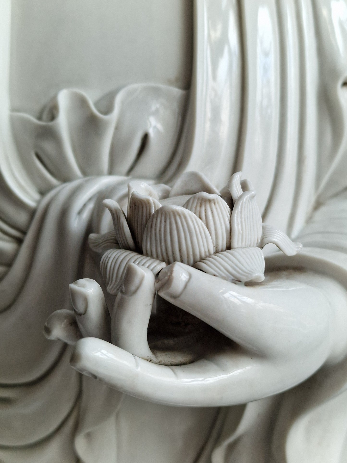 A large Dehua blanc-de-chine figure of Amitabha Buddha with apocryphal He Chaozong and Dehua marks — 19th/20th century