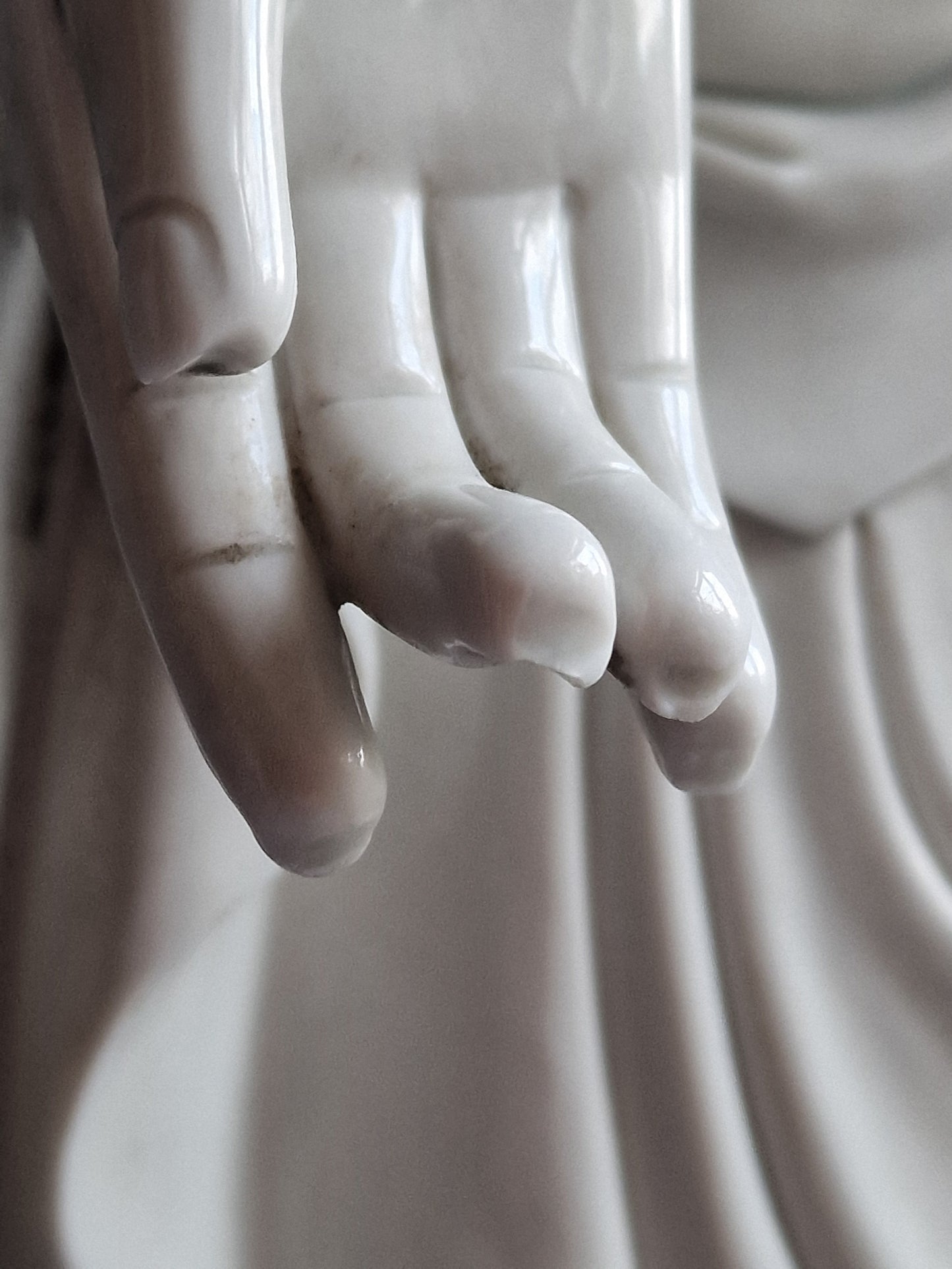 A large Dehua blanc-de-chine figure of Amitabha Buddha with apocryphal He Chaozong and Dehua marks — 19th/20th century