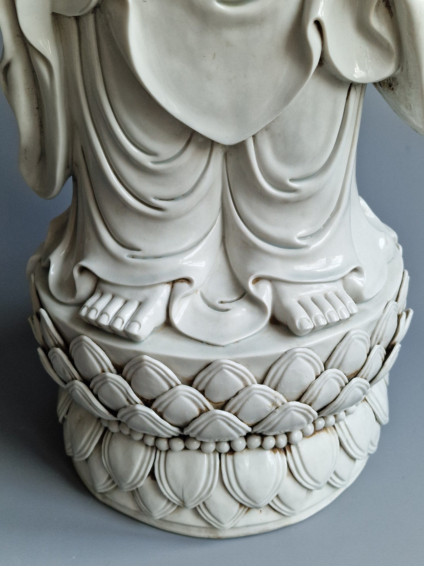 A large Dehua blanc-de-chine figure of Amitabha Buddha with apocryphal He Chaozong and Dehua marks — 19th/20th century