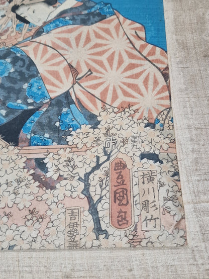 A Japanese woodblock print of an oiran in an interior — Utagawa Kunisada (Toyokuni III, 1786–1864), Edo period