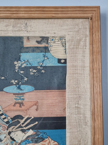 A Japanese woodblock print of an oiran in an interior — Utagawa Kunisada (Toyokuni III, 1786–1864), Edo period