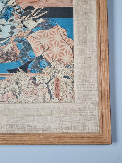 A Japanese woodblock print of an oiran in an interior — Utagawa Kunisada (Toyokuni III, 1786–1864), Edo period