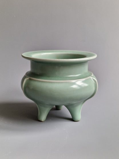 A Chinese Longquan celadon tripod censer