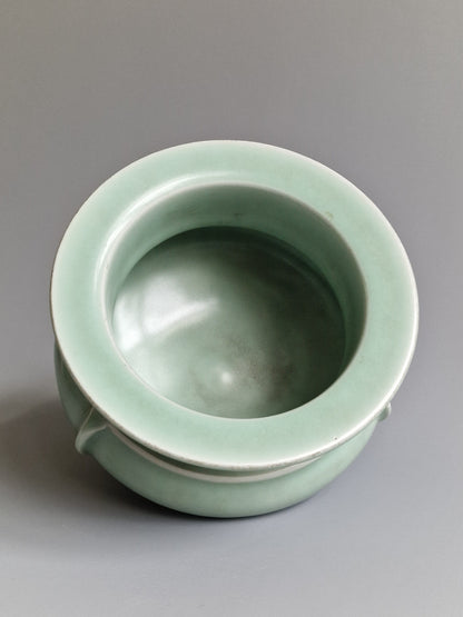 A Chinese Longquan celadon tripod censer