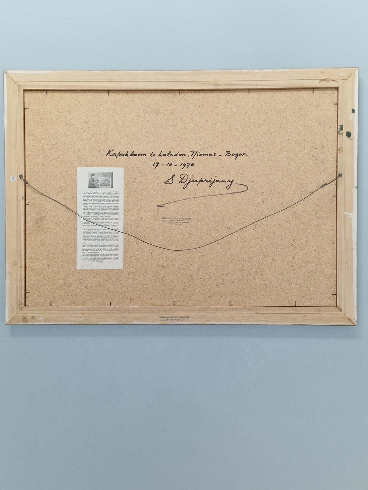 A Bogor (Indonesia) landscape with figures, oil on canvas, by S. Djuprijany — dated 1970