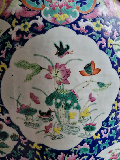 A large Chinese famille rose vase with lion-mask handles — early 19th century
