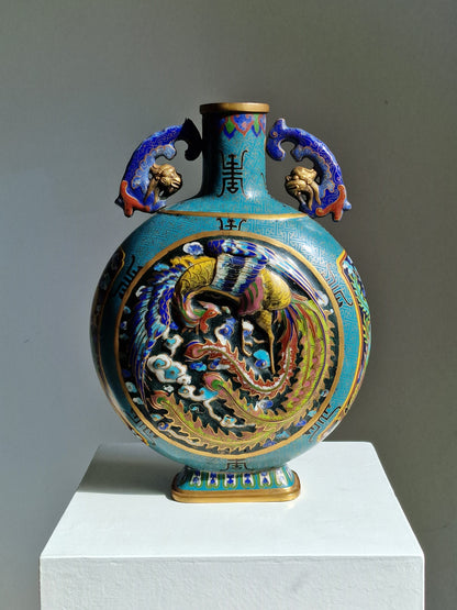 A Chinese cloisonné enamel moon flask with dragon and phoenix decoration, Qianlong mark, late 19th–early 20th century