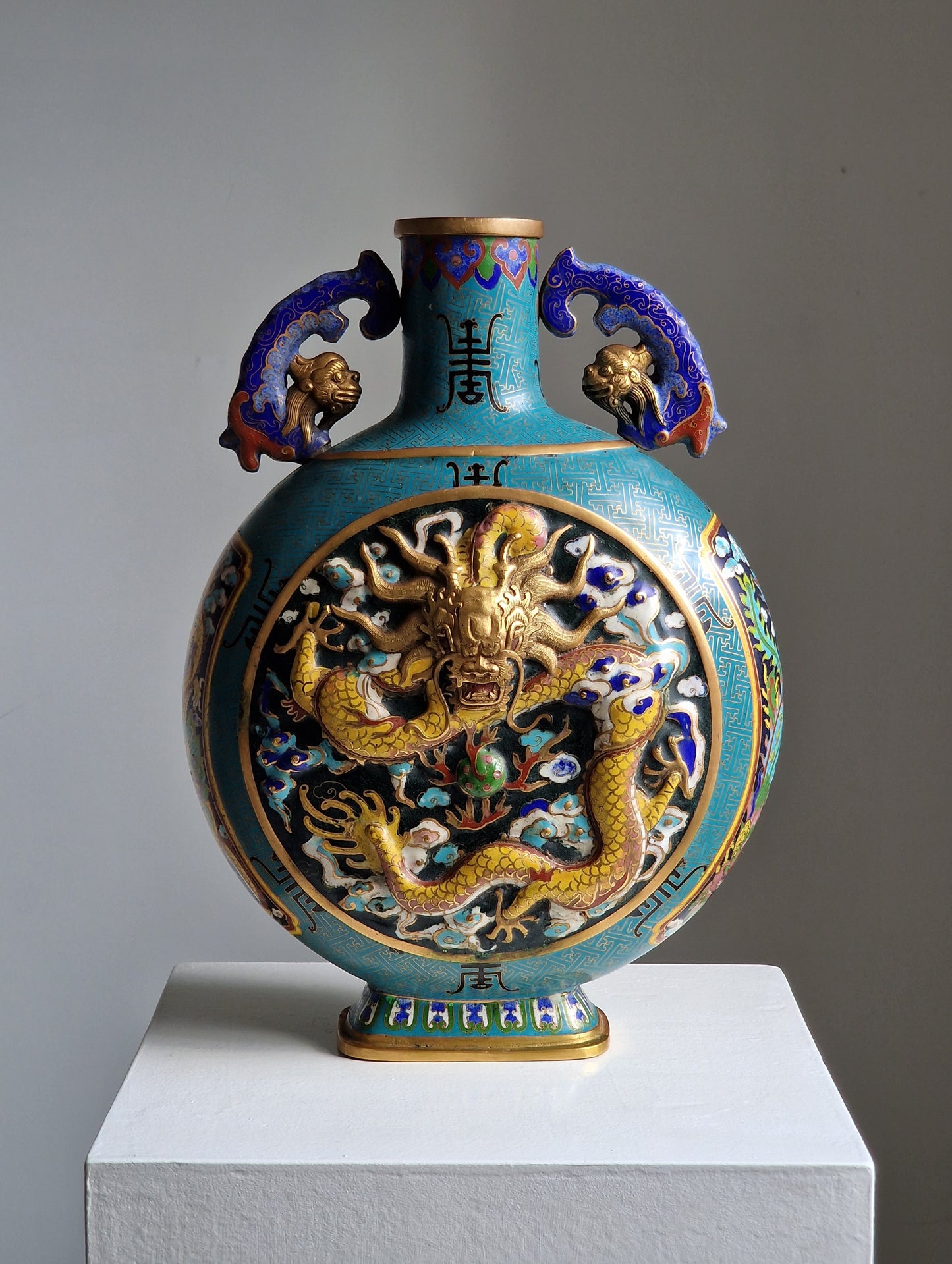A Chinese cloisonné enamel moon flask with dragon and phoenix decoration, Qianlong mark, late 19th–early 20th century
