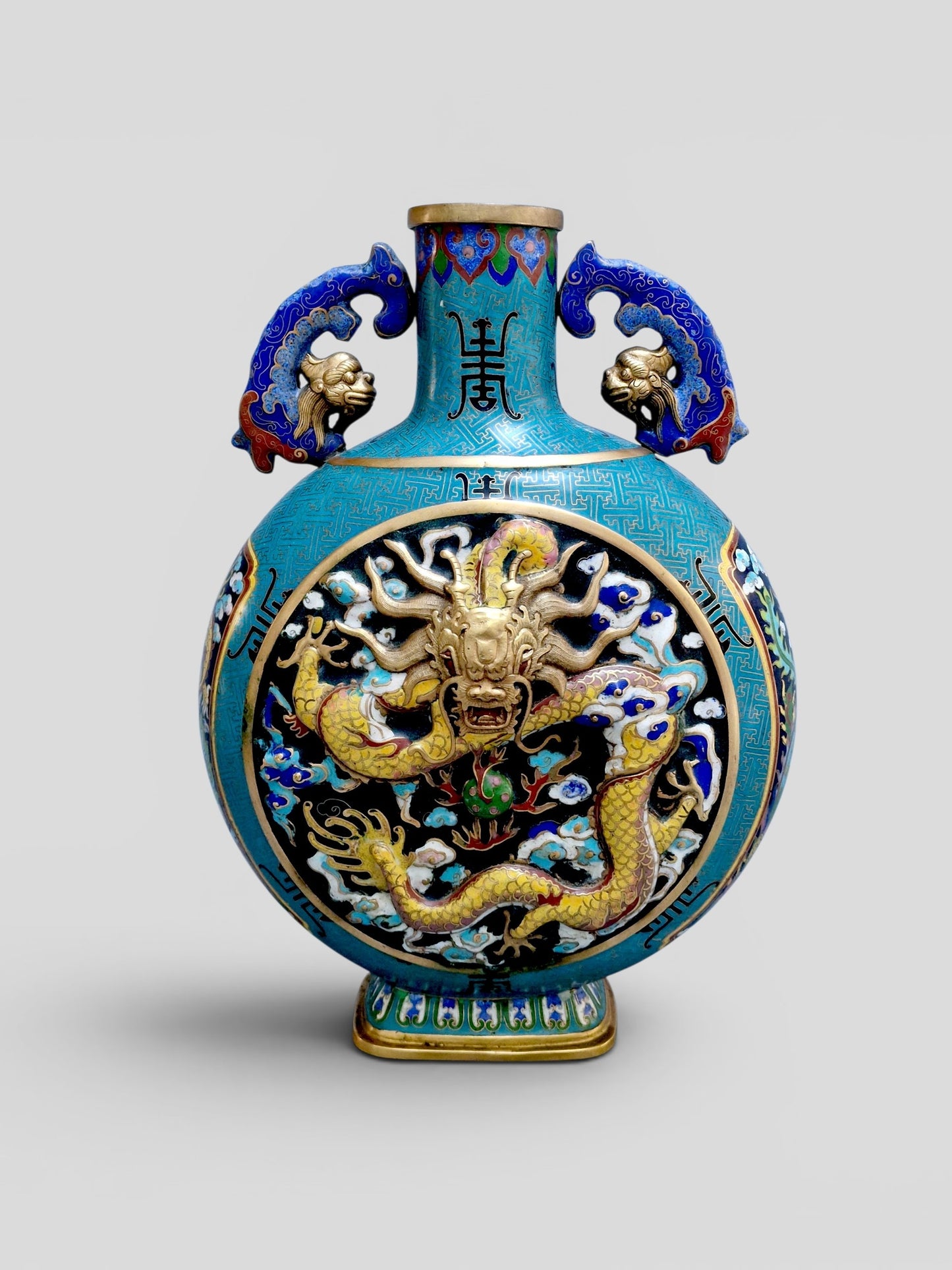 A Chinese cloisonné enamel moon flask with dragon and phoenix decoration, Qianlong mark, late 19th–early 20th century