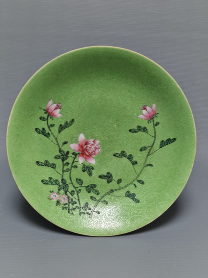 A Chinese famille rose lime-green sgraffito-ground porcelain dish with floral decoration, Guangxu mark and probably of the period (1875–1908)