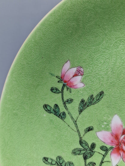 A Chinese famille rose lime-green sgraffito-ground porcelain dish with floral decoration, Guangxu mark and probably of the period (1875–1908)
