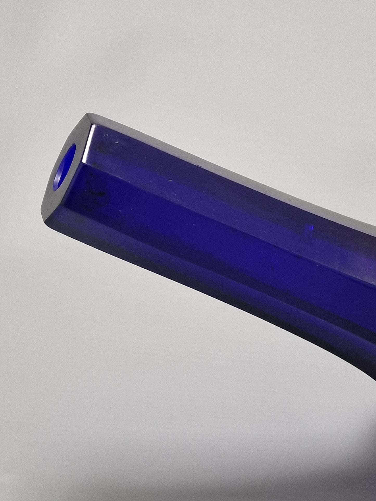 A Chinese blue Beijing glass octagonal bottle vase, Qianlong mark, with an Emery & Cie, Paris label — Republic period (1912–1949)