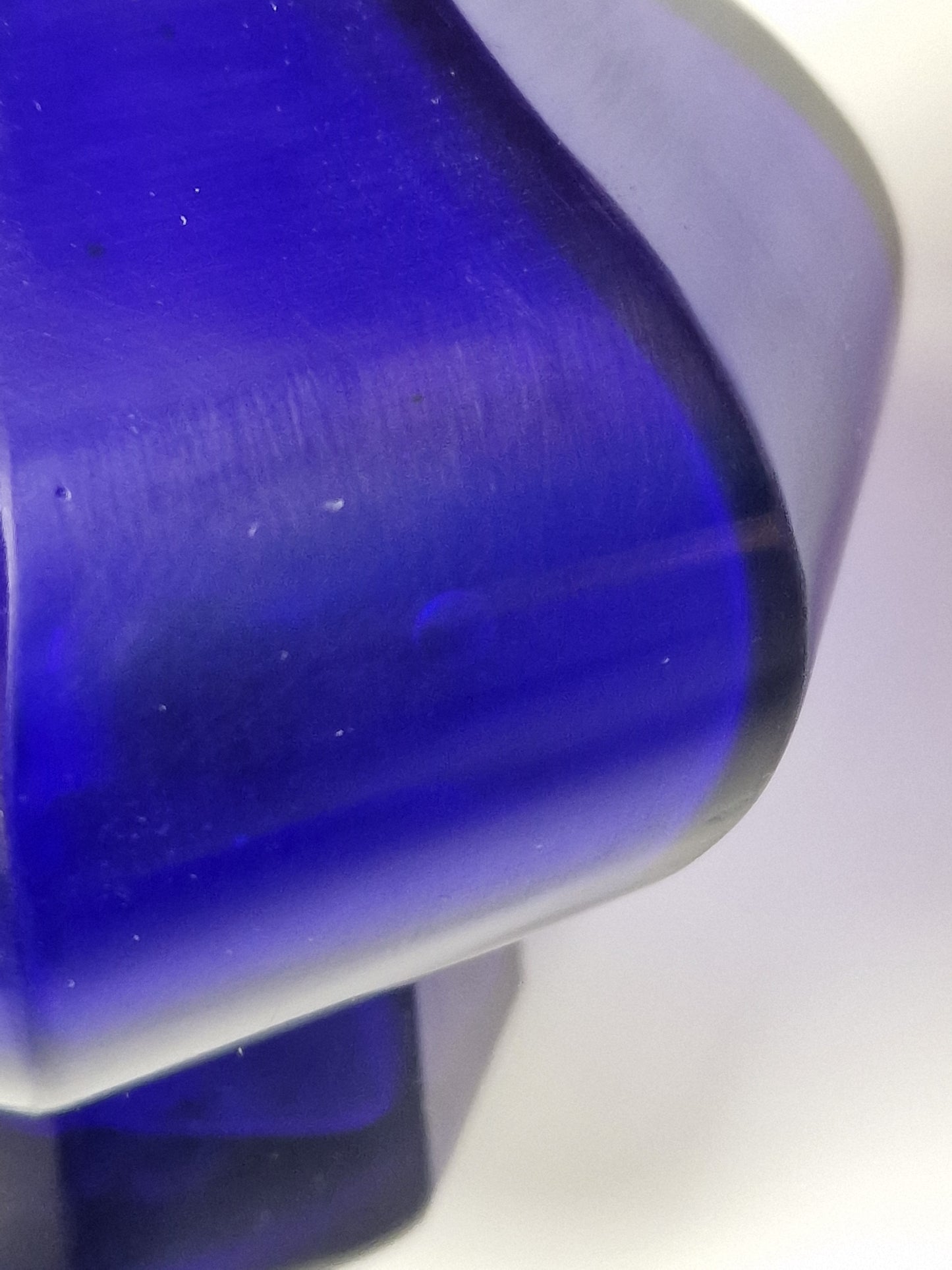 A Chinese blue Beijing glass octagonal bottle vase, Qianlong mark, with an Emery & Cie, Paris label — Republic period (1912–1949)