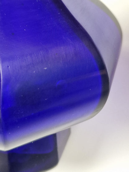A Chinese blue Beijing glass octagonal bottle vase, Qianlong mark, with an Emery & Cie, Paris label — Republic period (1912–1949)