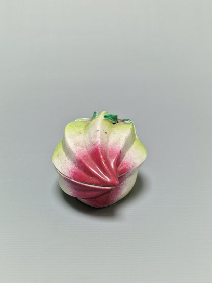 A Chinese famille rose porcelain peach-form covered box — Qing Dynasty, 19th Century