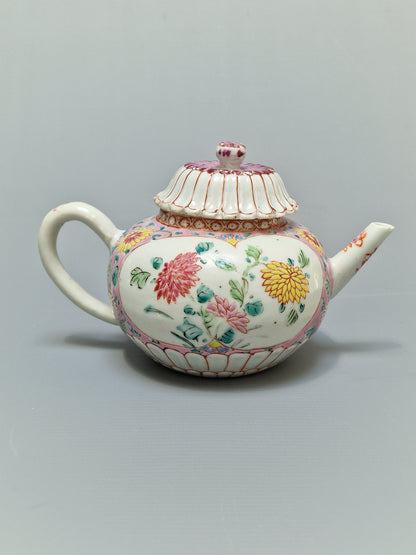 A Chinese famille rose teapot and matching stand with floral decoration — Yongzheng/Qianlong Period (1723–1795)