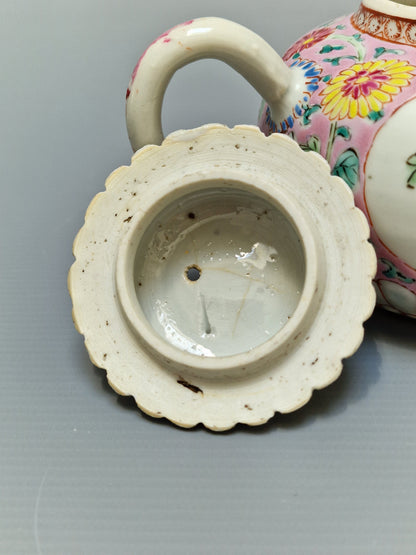 A Chinese famille rose teapot and matching stand with floral decoration — Yongzheng/Qianlong Period (1723–1795)