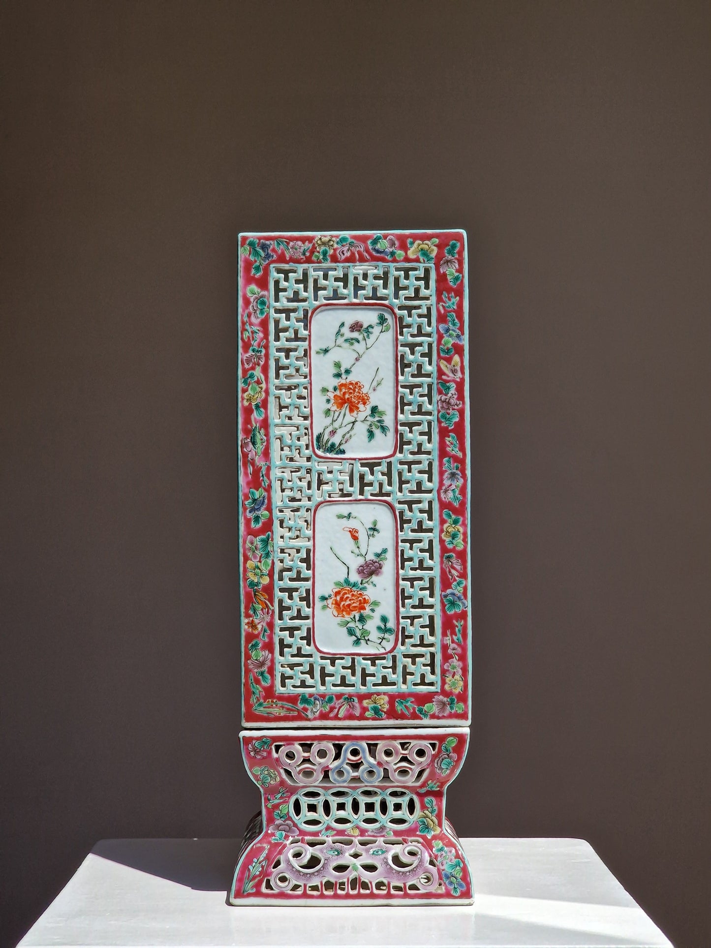 A Chinese famille rose reticulated square lantern with a stand — 19th century