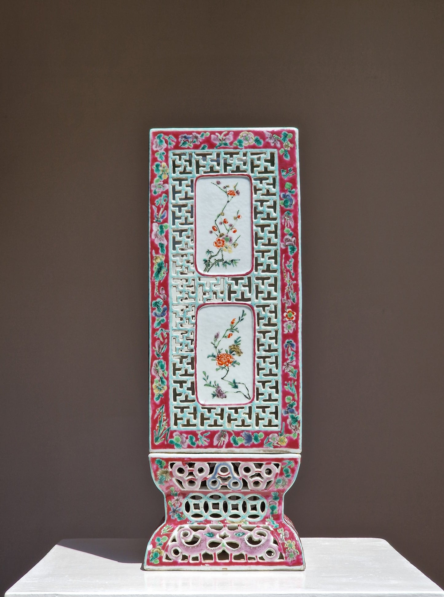 A Chinese famille rose reticulated square lantern with a stand — 19th century