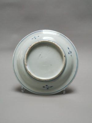 A Chinese porcelain plate featuring a lady with bamboo, dating to the Tianqi/Chongzhen period, approximately 1621-1644