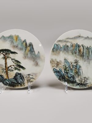 A rare set of Chinese porcelain round Qianjiang Cai plaques hand-painted by artist 邹国钧 Zou Guojun (1913-1996), circa 1970