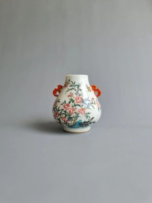 A small Famille Rose ‘hu’ vase with underglaze blue Qianlong mark, 18th century