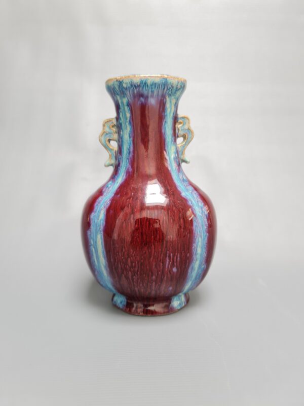 A Chinese porcelain flambé-glazed 'hu' vase, Qianlong mark
