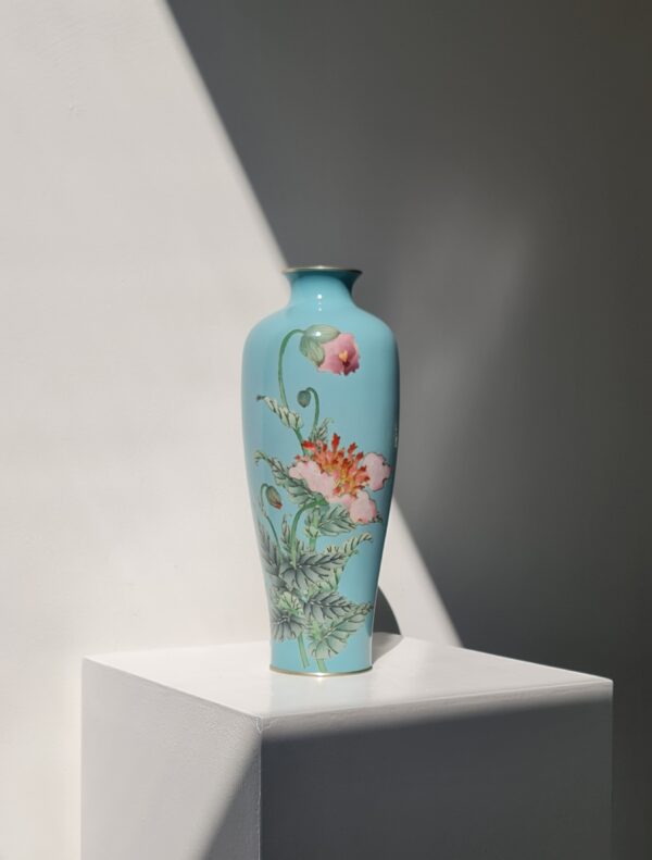A Japanese cloisonné enamel vase with a blue-turquoise ground and floral decorations, created and signed by Jin-noe Ohta (1858–1907)