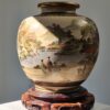 A large Japanese Satsuma vase decorated with figural scenes from court life, Meiji period (1868–1912)