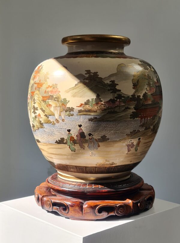A large Japanese Satsuma vase decorated with figural scenes from court life, Meiji period (1868–1912)